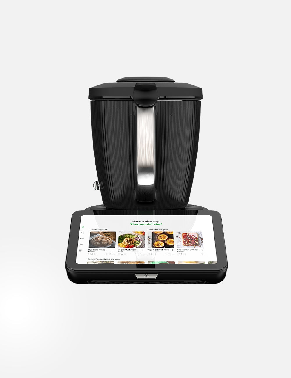 Thermomix TM7 on the counter showing the mixing bowl, lid and integrated touchscreen